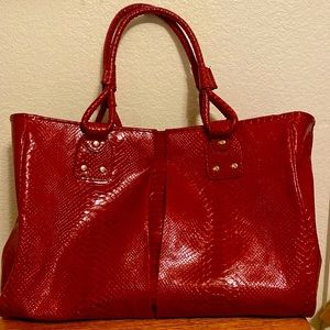 Elizabeth ARDEN tote bag it’s red with a leopard print inside